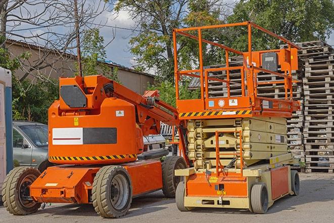 forklift carrying pallets in warehouse in Camden, IN