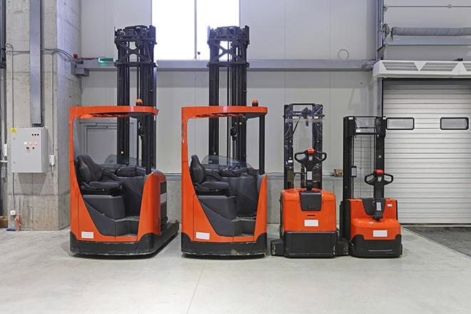 warehouse equipment - forklifts in operation